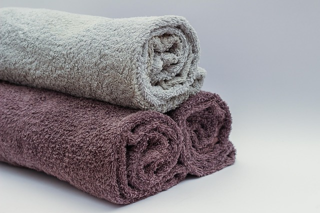 folded towels neutral beige and cream minimalist home comfort